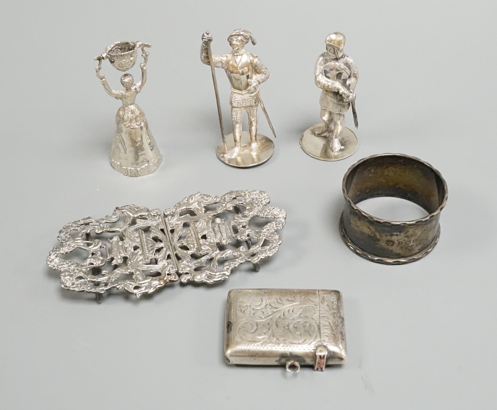 A continental 800 standard white metal miniature wager cup, 64mm, a modern silver belt buckle, silver vesta case and three other items.